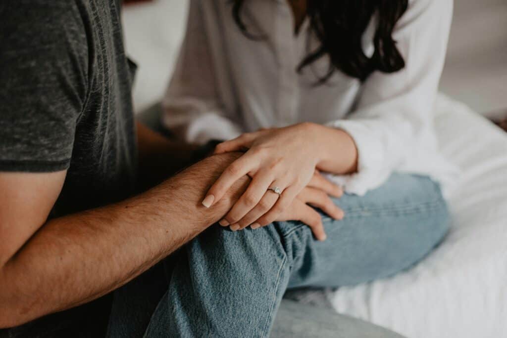 hands man and woman couple wedding ring